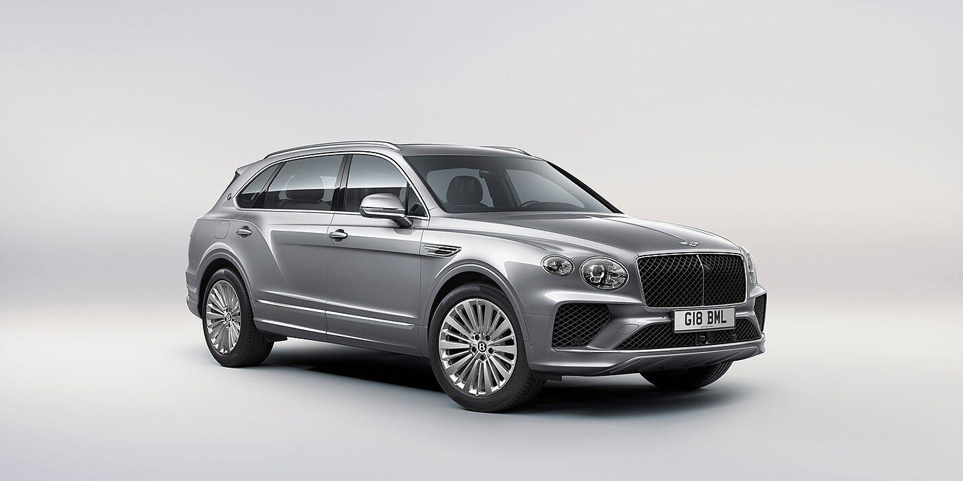 Bentley Riyadh Bentley Bentayga Extended Wheelbase luxury SUV front three quarter view in Moonbeam paint with 21 inch five spoke painted wheels