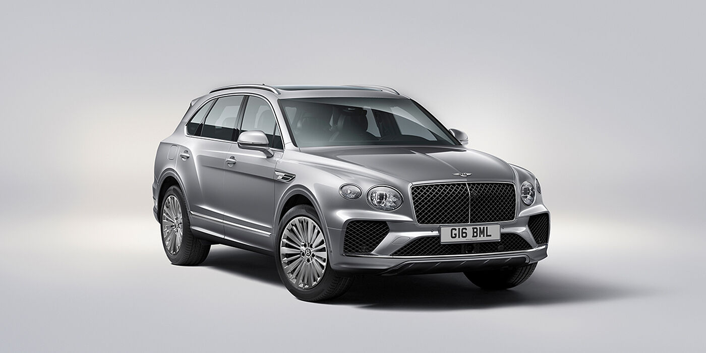 Bentley Riyadh Bentley Bentayga luxury SUV front three quarter view in Moonbeam paint with matrix grille and 21″ 5 spoke painted wheels