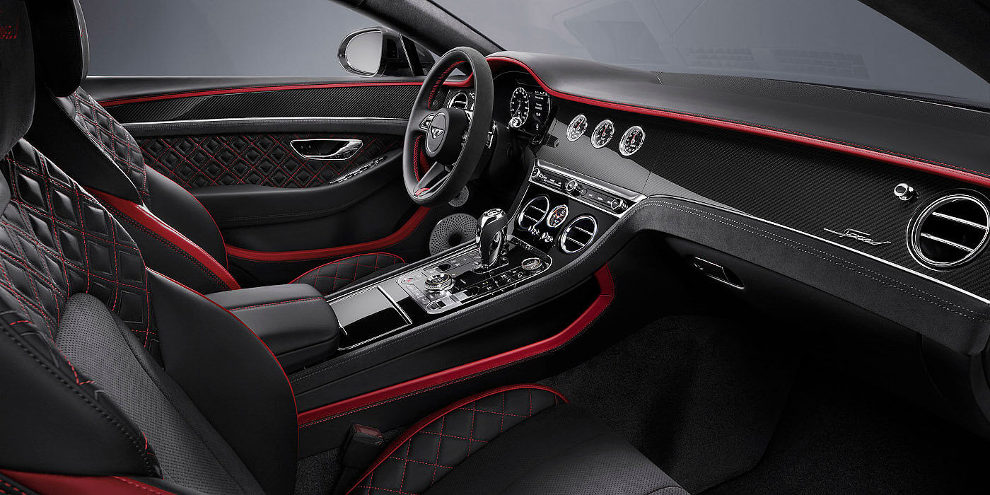 Bentley Riyadh Bentley Continental GT Speed coupe front interior in Beluga black and Hotspur red hide