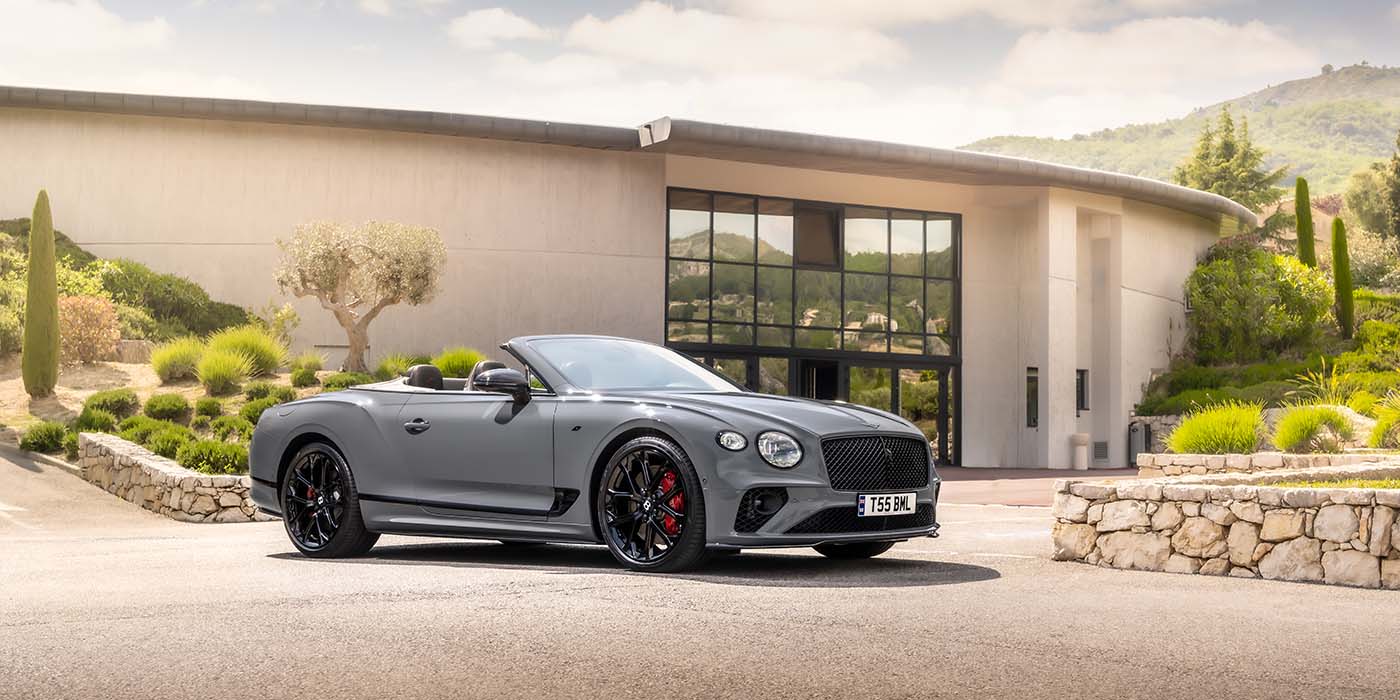 Bentley Riyadh Bentley Continental GTC S convertible in Cambrian Grey paint front 34 static near house