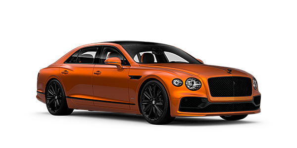 Bentley Riyadh Bentley Flying Spur Speed front side angled view in Orange Flame coloured exterior. 