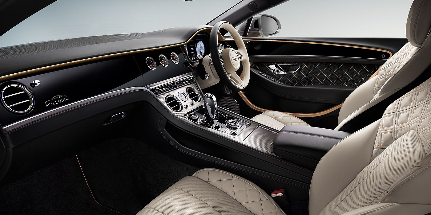 Bentley Riyadh Bentley Continental GT Mulliner coupe front interior in Beluga black and Linen hide