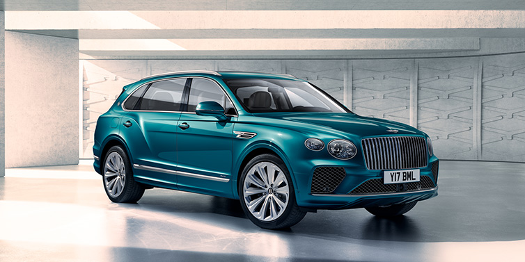 Bentley Riyadh Bentley Bentayga Extended Wheelbase Azure SUV front three quarter in Topaz blue paint colour with a grey background