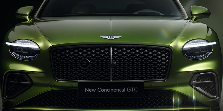 Bentley Riyadh Bentley Continental GTC Speed convertible front bonnet detail in Tourmaline Green paint showing new light design