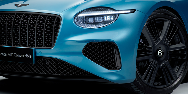 Bentley Riyadh New Bentley Continental GT Azure coupe bonnet detail with Blackline Specification including black grille and wheels with Light Windsor blue paint